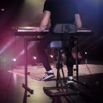 Height adjustable stool with foot and backrest